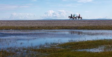 Mongolei - Reiter am Huvsgul See